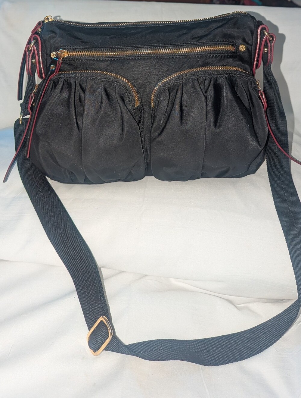 MZ Wallace Paige Black Nylon Crossbody Bag with Gold Hardware and Red Trim
